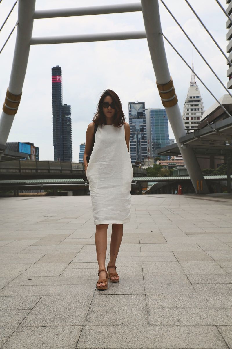 Catherine dress in white linen on a Bangkok skywalk